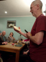 Mike Whitby with Mary's Monthly Plate whilst making his speech at the Pettistree Ringers Dinner.