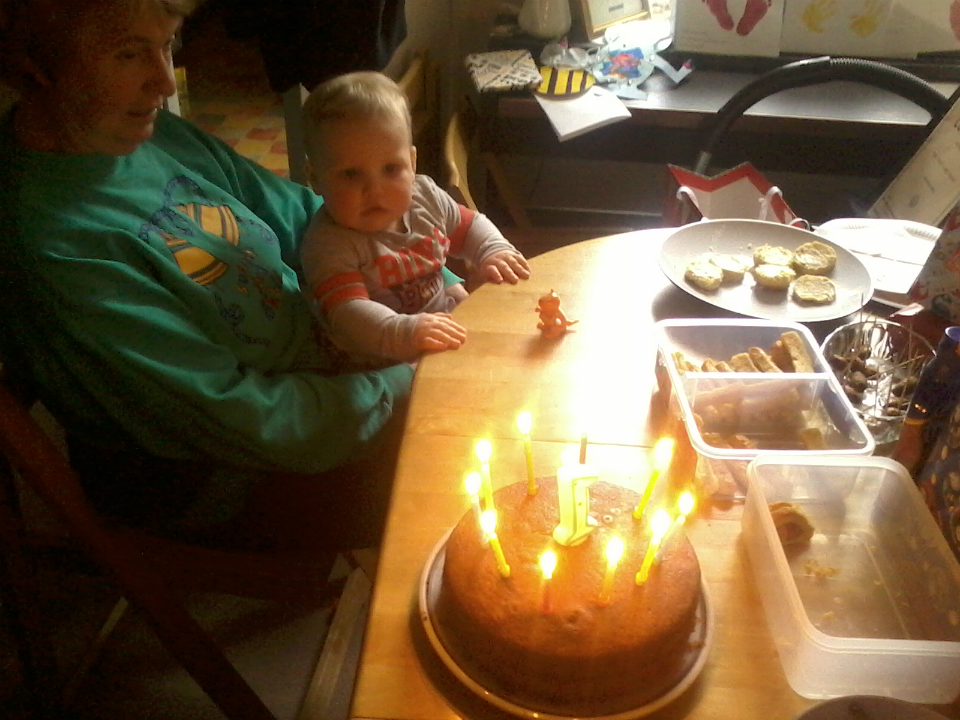 Alfie with his birthday cake and his Nana.