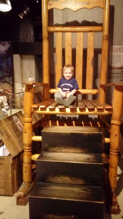 Alfie in a giant chair at Ripley's Believe It or Not