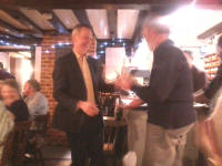 Chris Garner receives Mary's 'Monthly' Plate from Mike Whitby at the Pettistree Ringers' Dinner.
