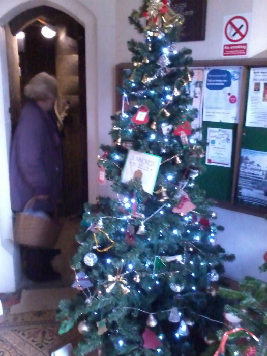 The ringers tree by the door to the stairs up to the ringing chamber at the St Mary-le-Tower Christmas Tree Festival.