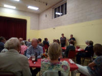 Michelle & Ed Rolph giving the answers of the quizzes & announcing the results at the Guild Social in Holton Village Hall.