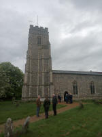 Ringers outside the church and in the village listening and/or waiting to ring.