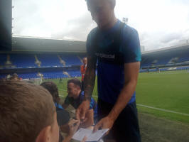 George Edmundson and Luke Woolfenden signing autographs at the Ipswich Town Open Day.