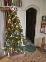 The Christmas Tree at the bottom of the stairs to St Mary-le-Tower ringing chamber.