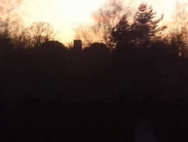 Halesworth church tower silhouetted on my journey home from Lowestoft.
