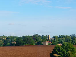 St Mary and St Peter church in Kelsale from the train.