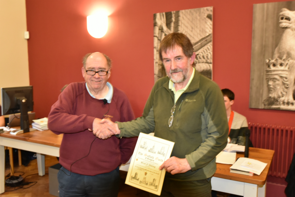 Alan Stanley presenting fifty years certificate to Brian Whiting.