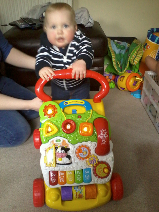 Alfie trying out his new walker.