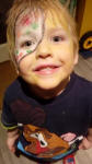 Alfie's face painted as Pudsey Bear for Children in Need.