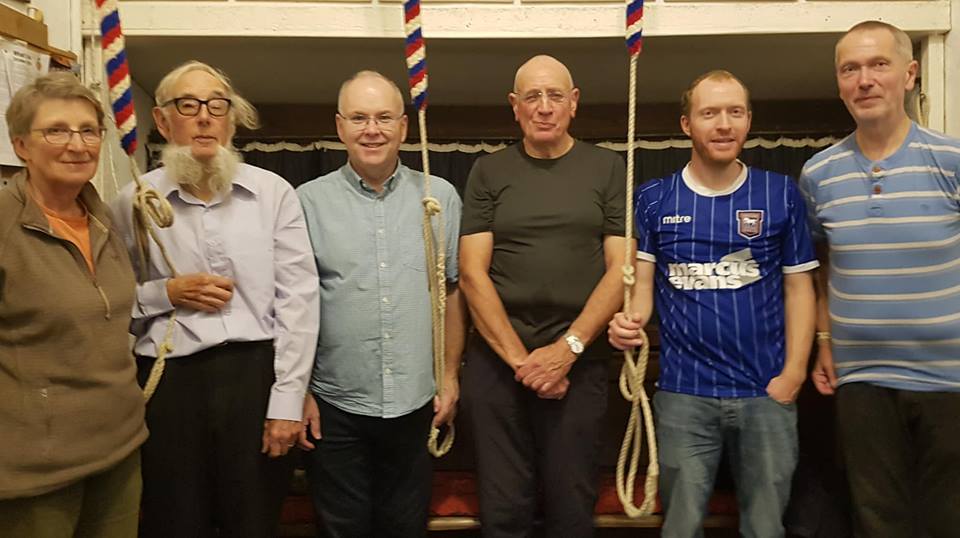 Peal band at Bredfield after the peal, with the ropes of the back three. L to r; Mary Garner, Micheal Pilgrim, Mark Ogden, Mike Cowling, Richard Munnings & Mike Whitby.