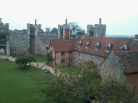 The tower of St Michael & All Angels, Framlingham - home to a 16cwt eight - pokes over the castle walls.