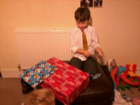 Mason opening his birthday presents.