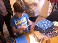 Mason opening more birthday presents!