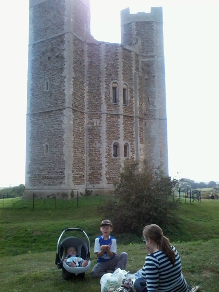 Having a picnic outside Orford Castle.