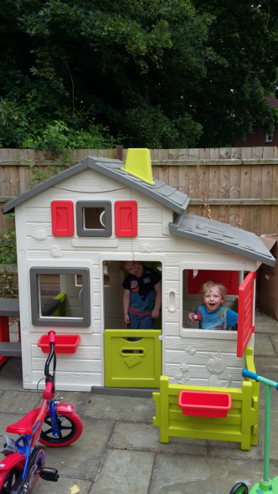 Alfie & Joshua in their new playhouse. Mini-mini-ring not installed yet.