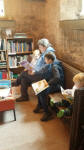 Kate reading to the boys at Poltimore church on Rambling Ringers Tour.