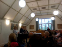 Judges Kate & Paul Flavell giving the results in the Song Room at the cathedral.