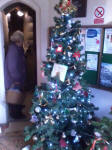 The ringers tree by the door to the stairs up to the ringing chamber at the St Mary-le-Tower Christmas Tree Festival.