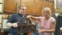Amanda Richmond demonstrates the mechanics of ringing with the help of Jonathan Williamson at the St Mary-le-Tower Open Day.