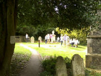Rambling Ringers gathered outside listening to the ringing at Tunstall.