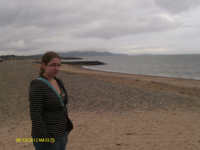 Ruthie on an overcast Bray beach.
