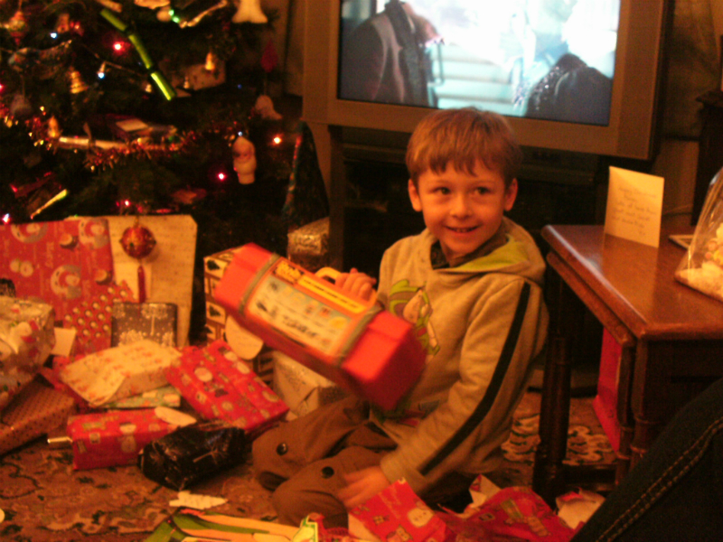 Mason gets stuck into the presents at his Nana and Granddad’s.