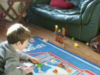 Mason tries out Angry Birds, one of his many presents!