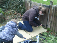 Ruthie and Mason fixing the gate.